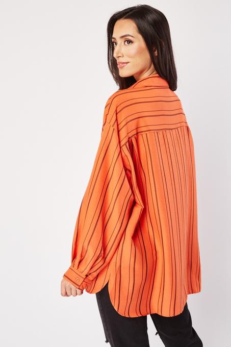 Chemise à rayures boutonnée