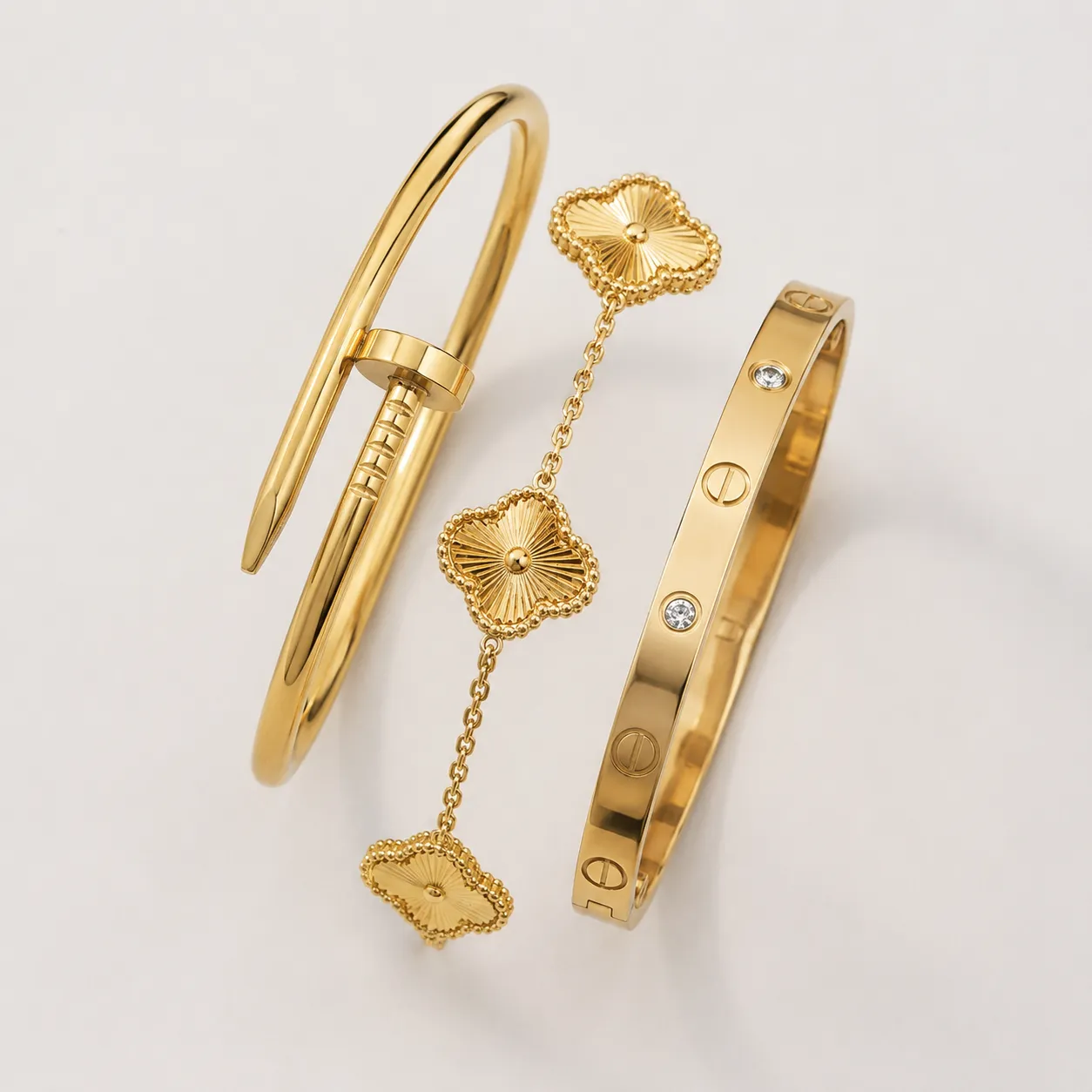 Trio de bracelets dorés en acier inoxydable