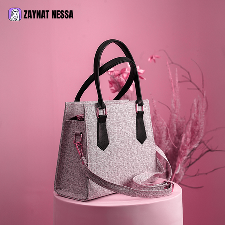 حقيبة يد أنيقة باللون البيج والأسود – تصميم عصري وراقي للنساء