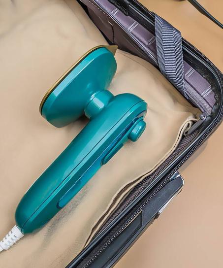 مكواة الملابس الصغيرة