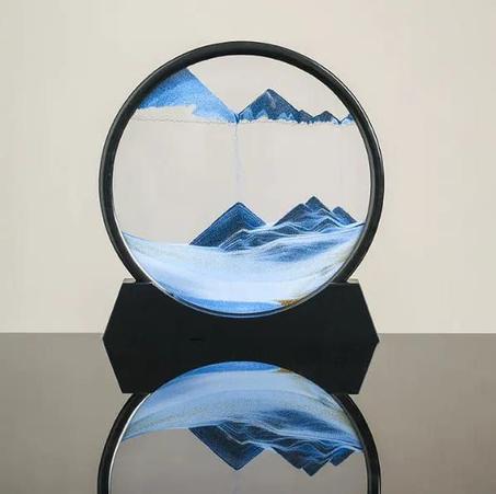 رمل متحرك بداخل زجاج مستديرraml