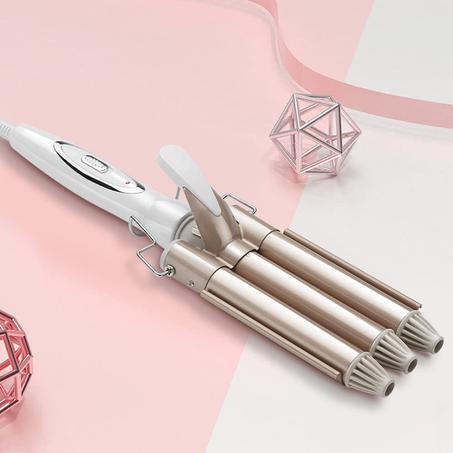 مكواة تمويج الشعر