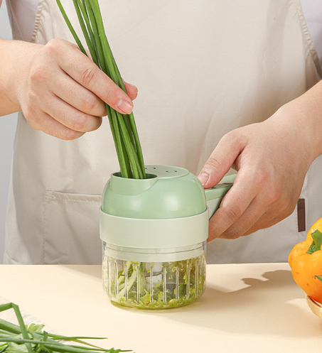 قطاعة اللحم والخضر الكهربائية الجديدة المحمولة يدويا