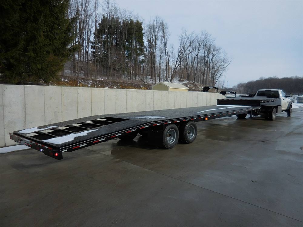 26,000 LB GVWR PROFESSIONAL SERIES STEP DECK THREE CAR HAULER TRAILER 48 FT TOTAL LENGTH (12' top deck, 28.6' main deck, and 8' dovetail)