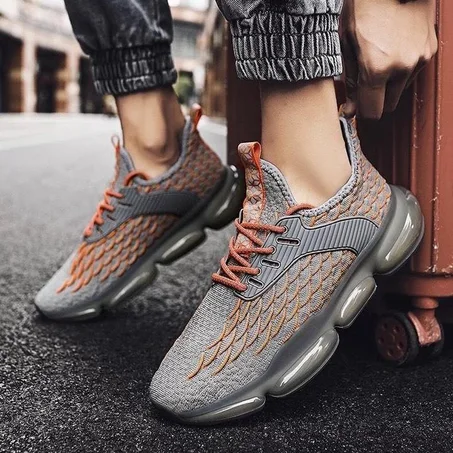 حذاء رياضي رصاصي و برتقالي