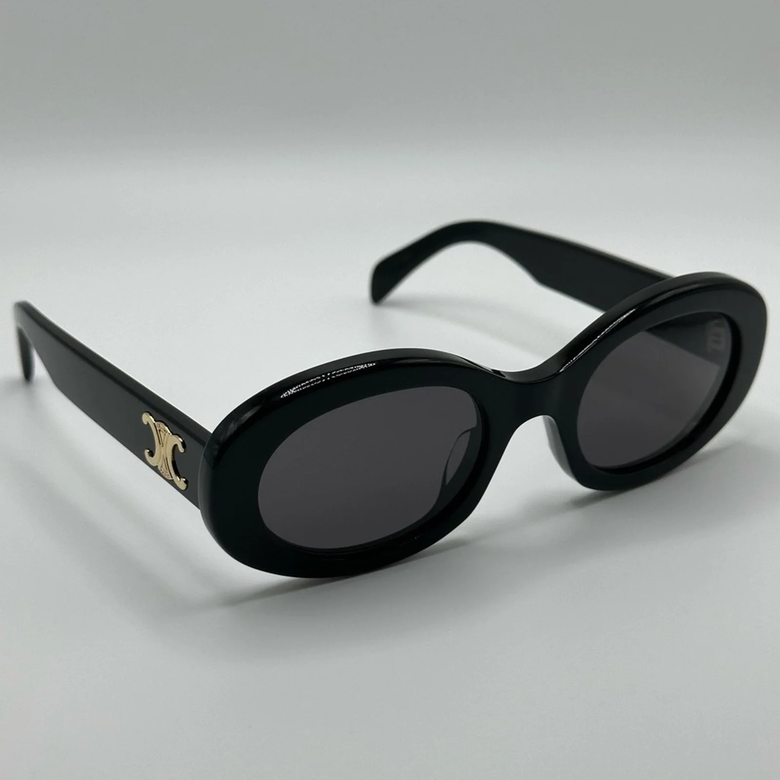 Triomphe 01 oval sunglasses black