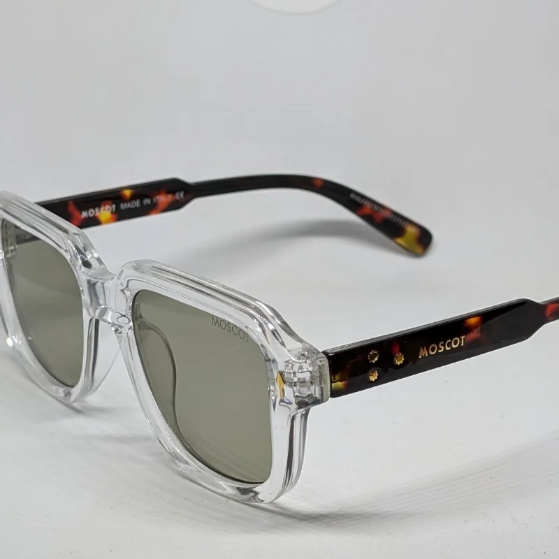 نظارات موسكوت (Moscot) بإطار شفاف وذراعي 