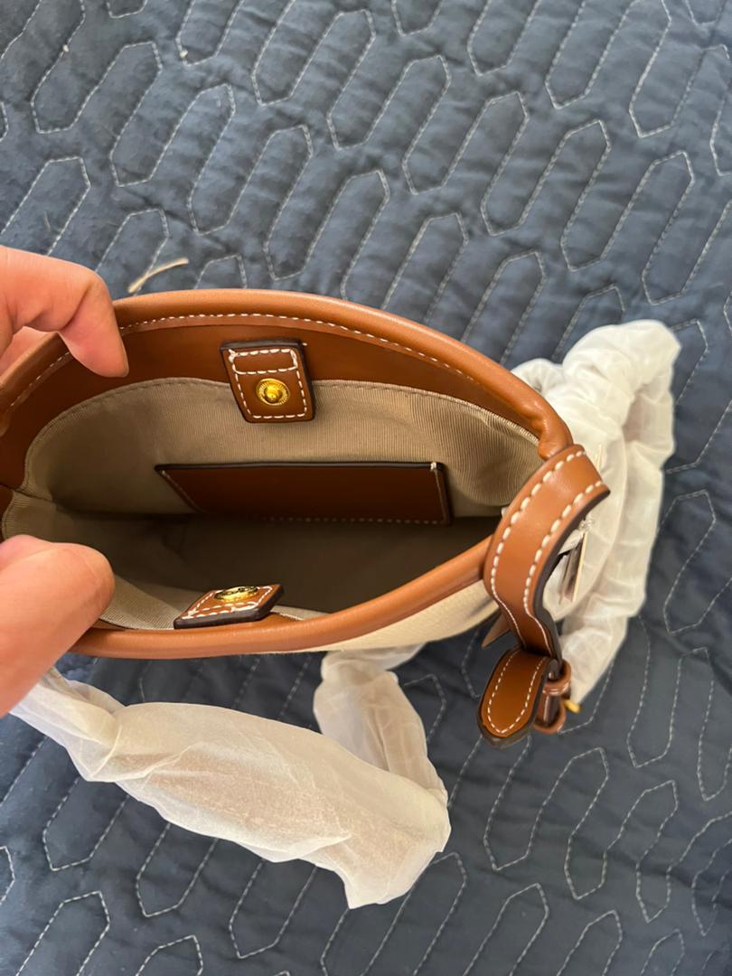 🤍 شنطة مايـلا – البساطة الفاخرة بأسلوب البوكت