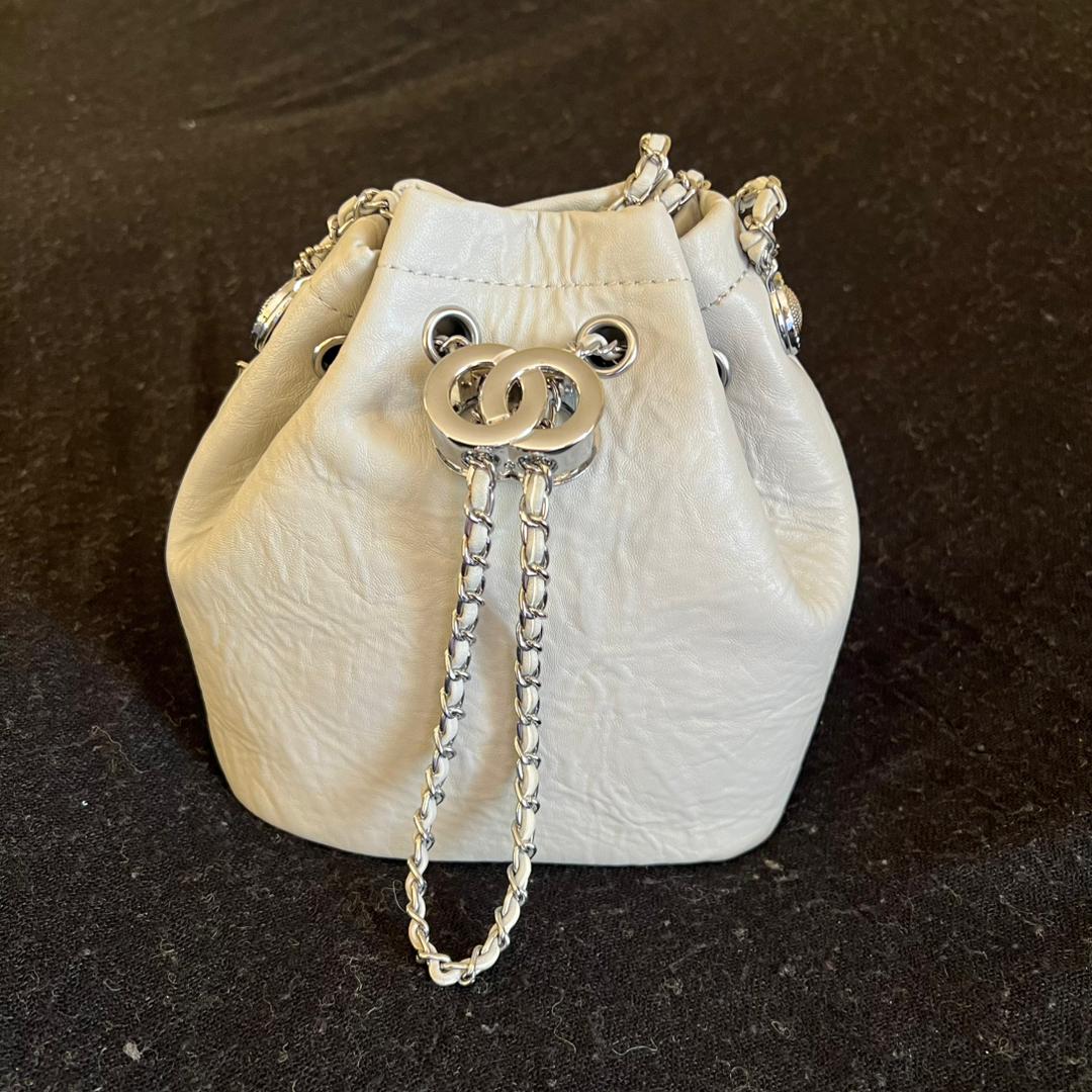 شنطة لوتس دروست – Lotus Drawstring (موديل السلسلة)