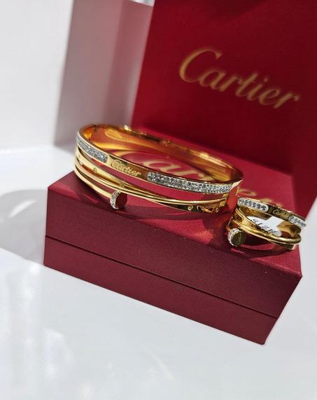 Ensemble acier doré cartier