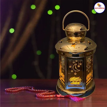 فانوس رمضان ذهبي مع اغاني رمضان و اظاءة LED يعمل بالبطارية
