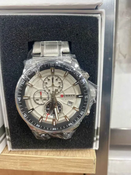 ساعةCURRENالأصلية