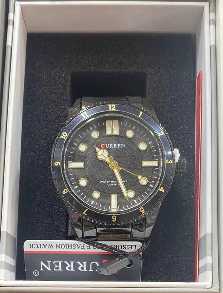 ساعةCURRENالأصلية