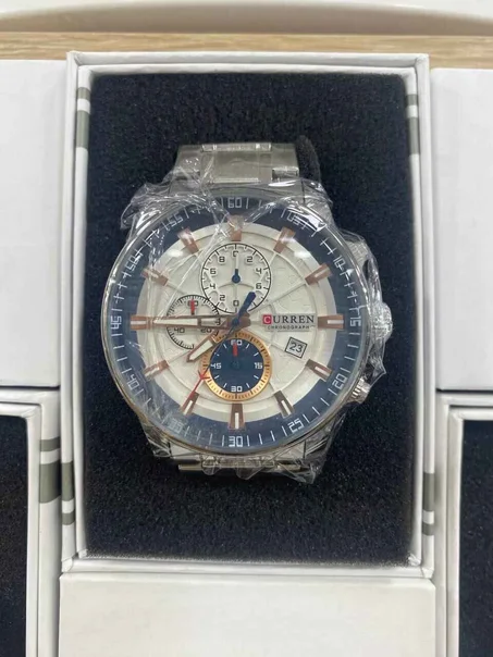 ساعةCURRENالأصلية