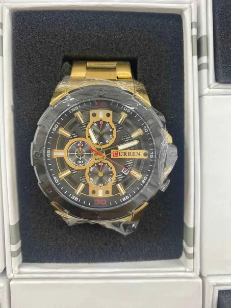 ساعةCURRENالأصلية