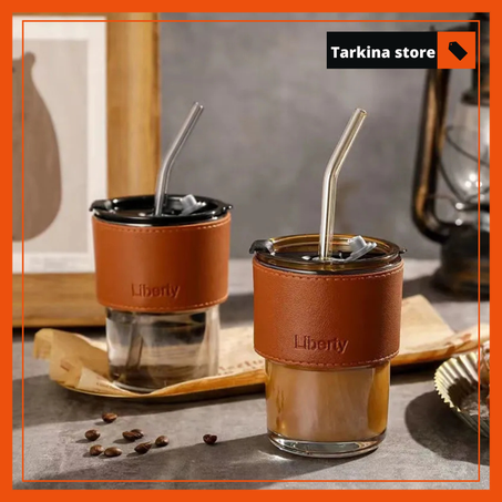 Glass cup with straw