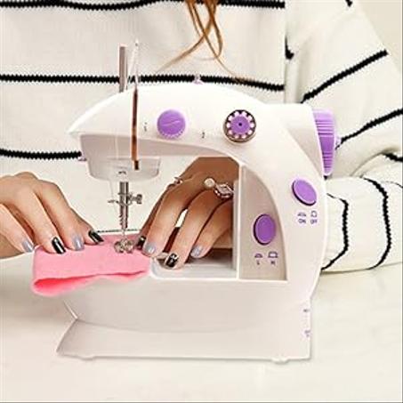 Sewing Machine    آلة الخياطة المحمولة
