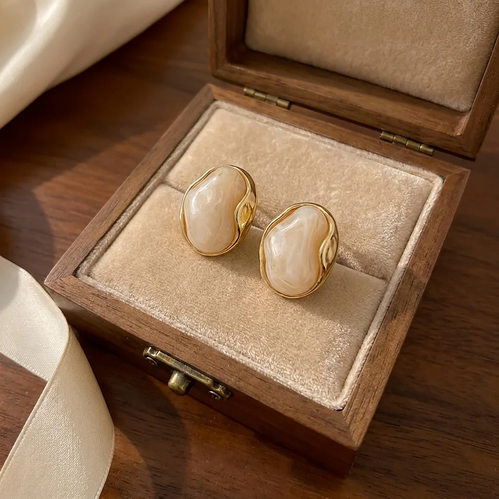 “Bientôt disponible” Boucles d'Oreilles Organiques 