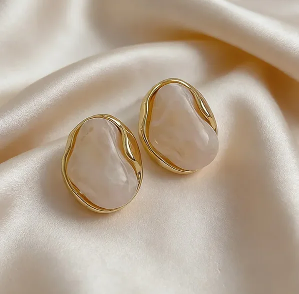 “Bientôt disponible” Boucles d'Oreilles Organiques 