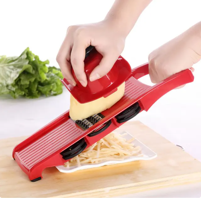 • عرض قطاعة سحرية 6 في 1 + جوانتي التقشير الرهيب