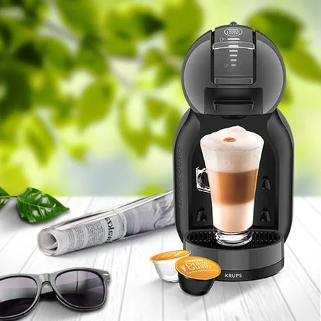 Nescafe Dolce Gusto Machine à café automatique 15 bar de pression compacte et moderne