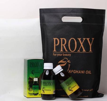 عبوة زيت بروكسي للشعر 125 مل + موزع زيت مجانا