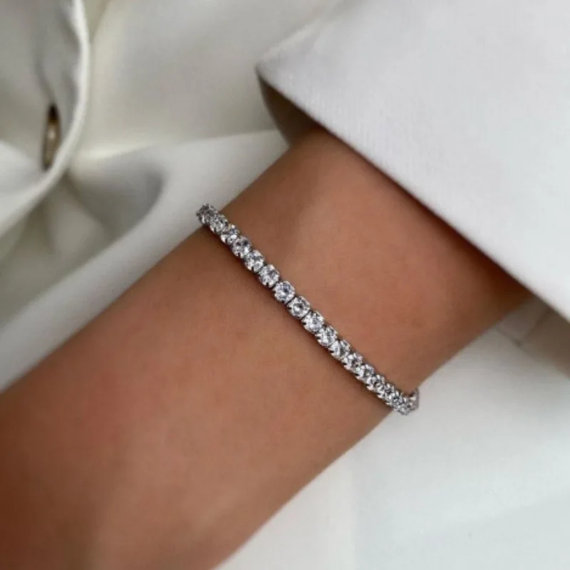 سوار ذهبي - فضي مرصع بالأحجار