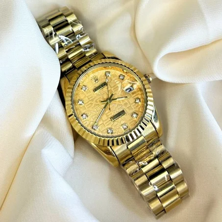 Montre Rolex dorée de luxe au motif raffiné