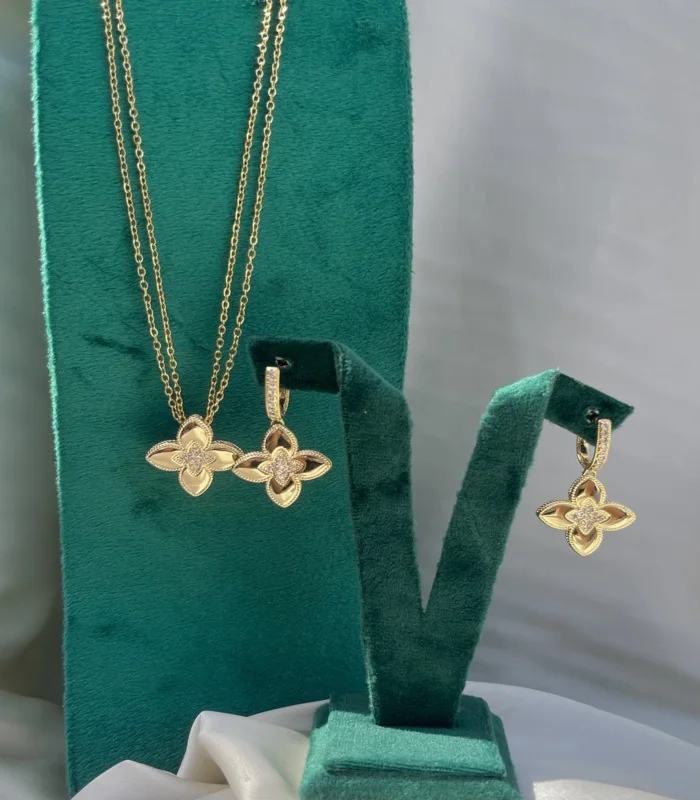 Sautoir double chaine +Boucle Fleur