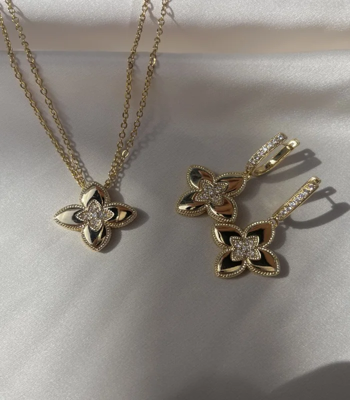 Sautoir double chaine +Boucle Fleur