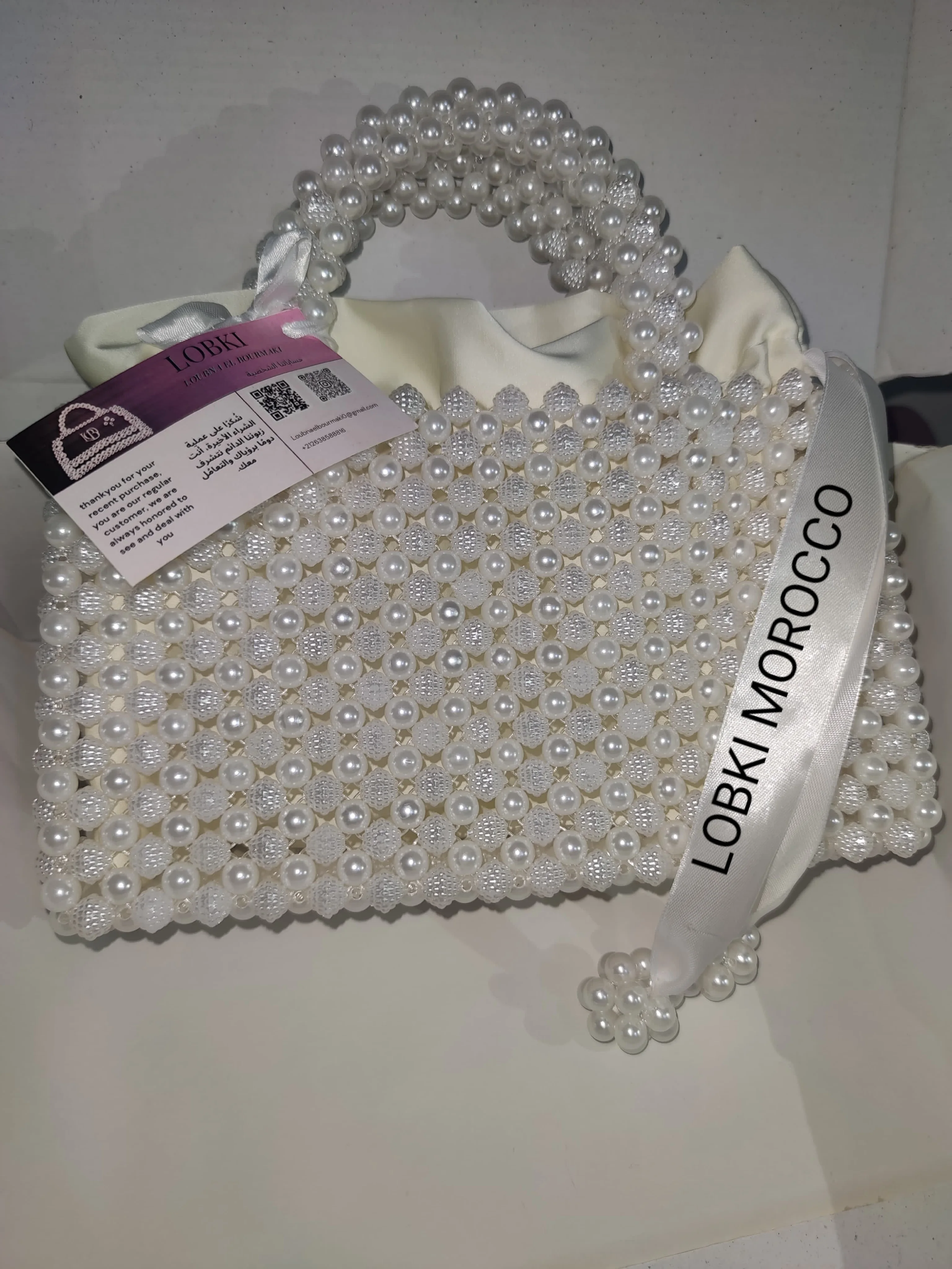 حقائب الاخلاص باللؤلؤ وحبات التوت مع حقيبة من الحرير