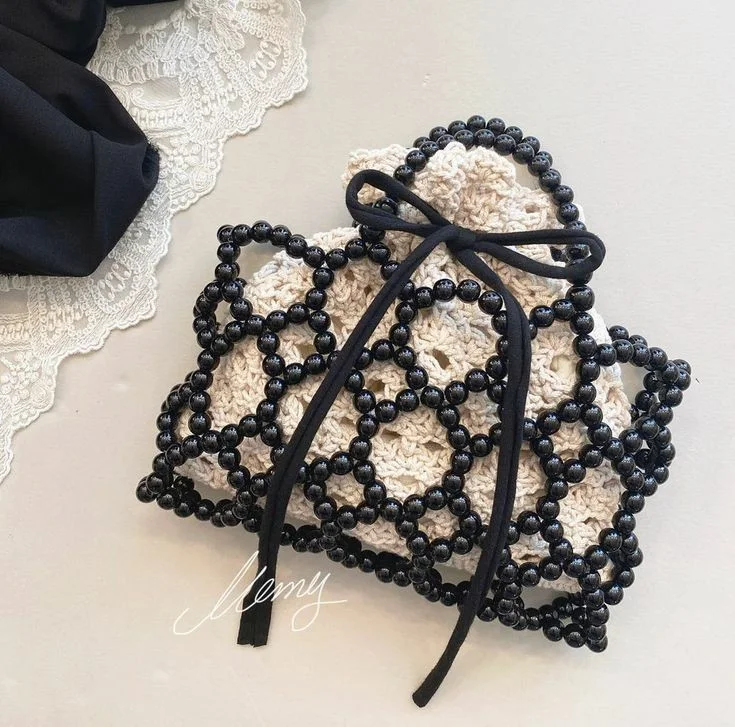 حقيبة اللؤلؤ المشبكة  لمسة من الأناقة اليومية