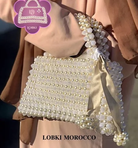 حقائب الاخلاص باللؤلؤ وحبات التوت مع حقيبة من الحرير