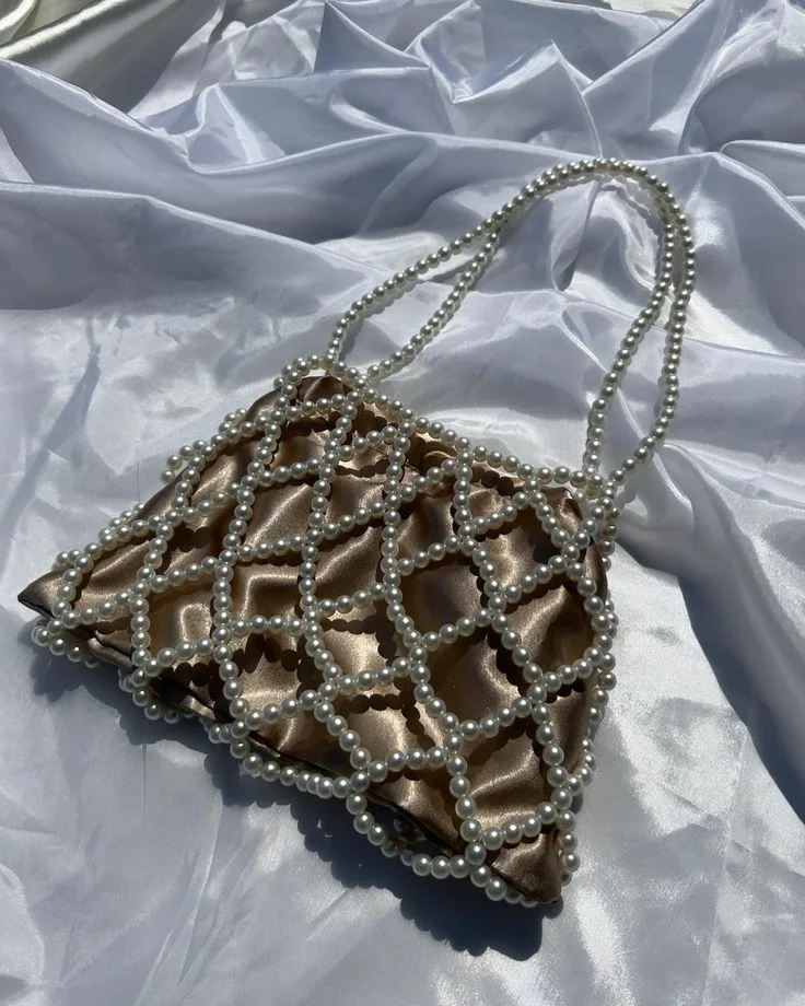 حقيبة اللؤلؤ المشبكة  لمسة من الأناقة اليومية