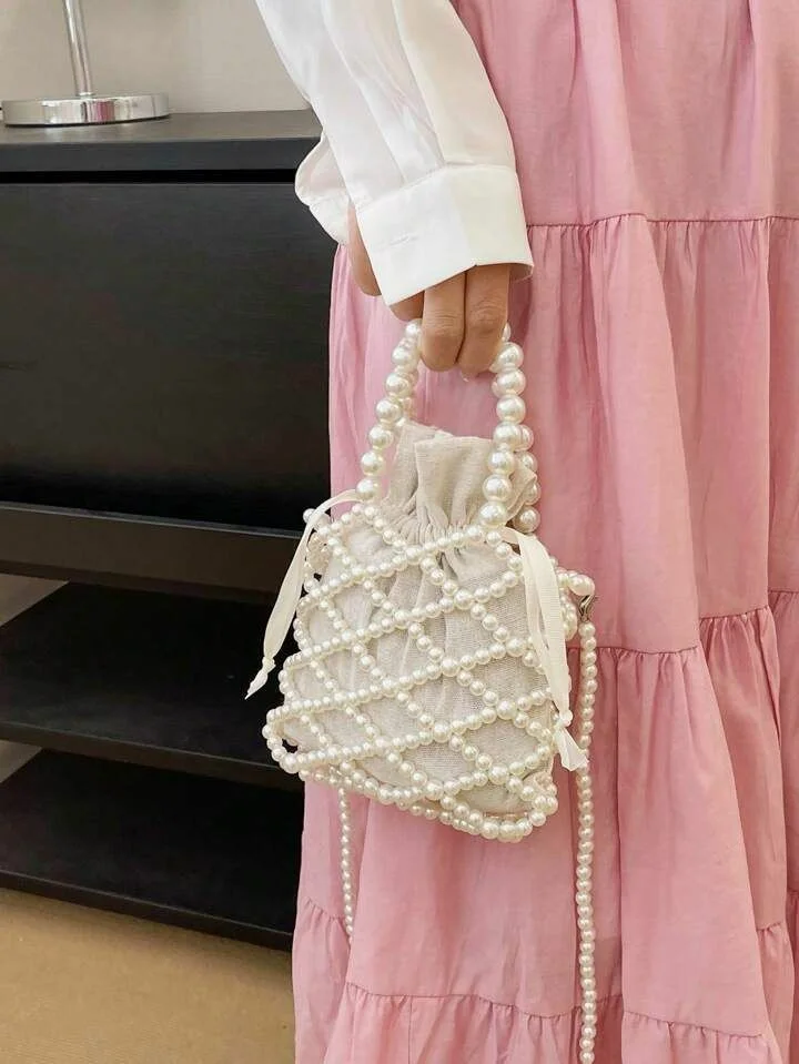 حقيبة اللؤلؤ المشبكة  لمسة من الأناقة اليومية