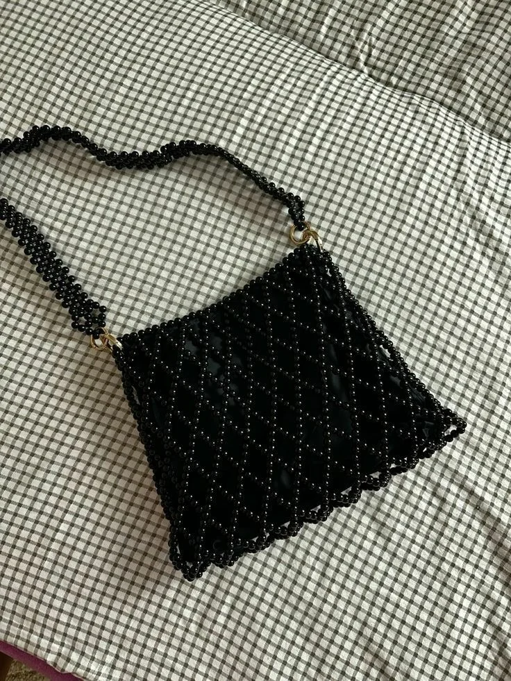 حقيبة اللؤلؤ المشبكة  لمسة من الأناقة اليومية