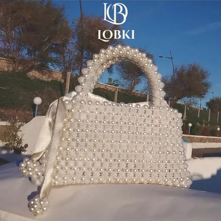 حقائب الاخلاص باللؤلؤ وحبات التوت مع حقيبة من الحرير