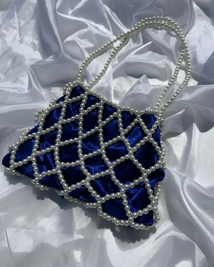 حقيبة اللؤلؤ المشبكة  لمسة من الأناقة اليومية