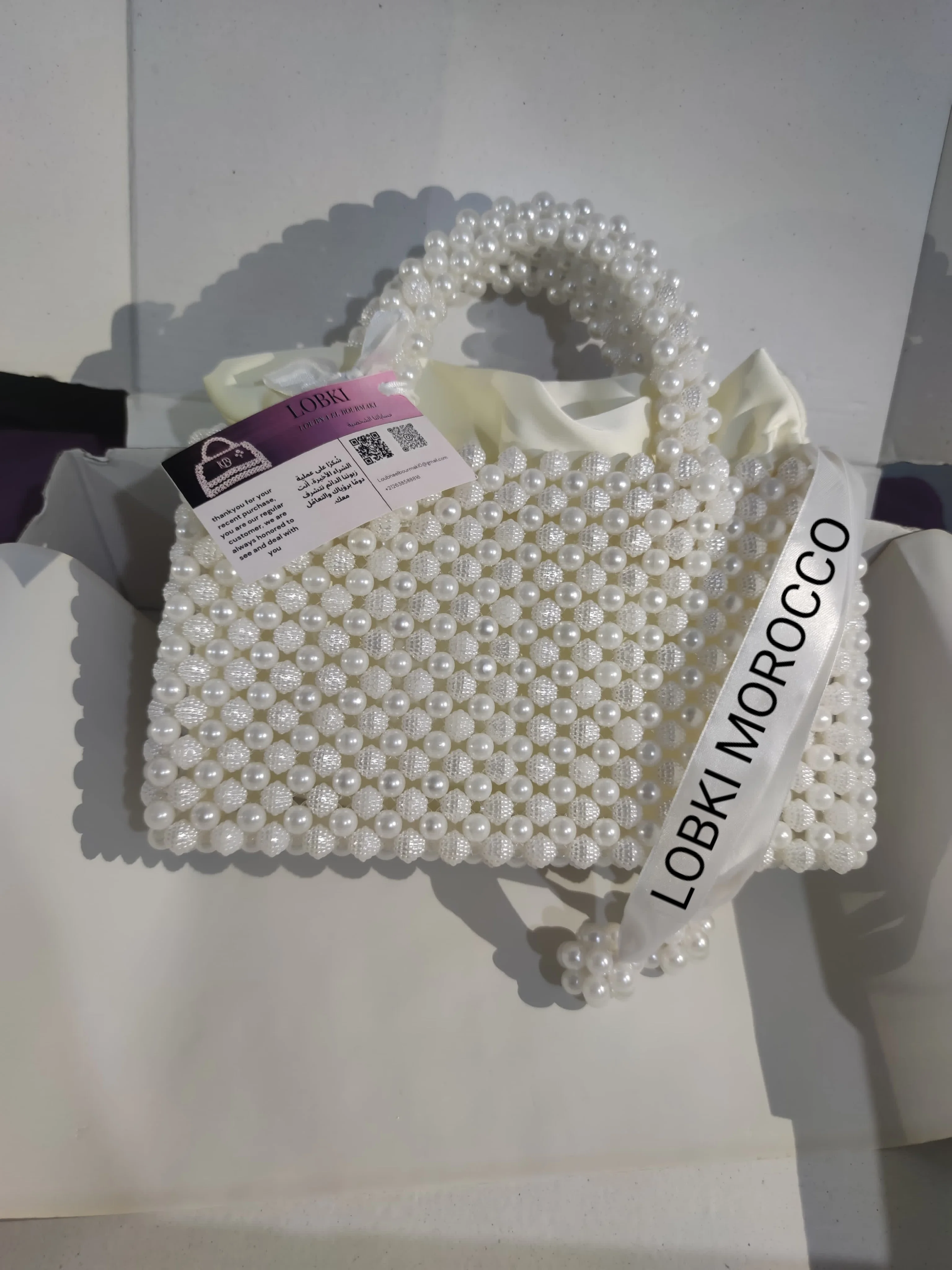 حقائب الاخلاص باللؤلؤ وحبات التوت مع حقيبة من الحرير