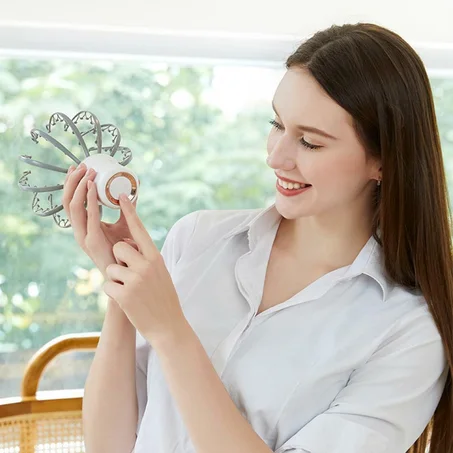 مدلك الرأس الكهربائي على شكـل أخطبـوط