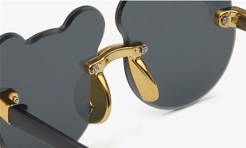 Lunettes de soleil forme ours
