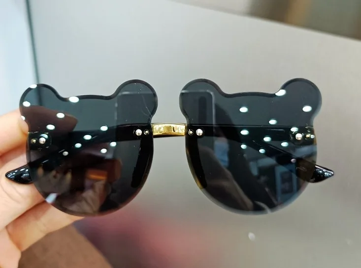 Lunettes de soleil forme ours