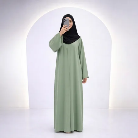 عباية أنيقة باللون الأخضر الهادئ – تصميم عصري  ✨