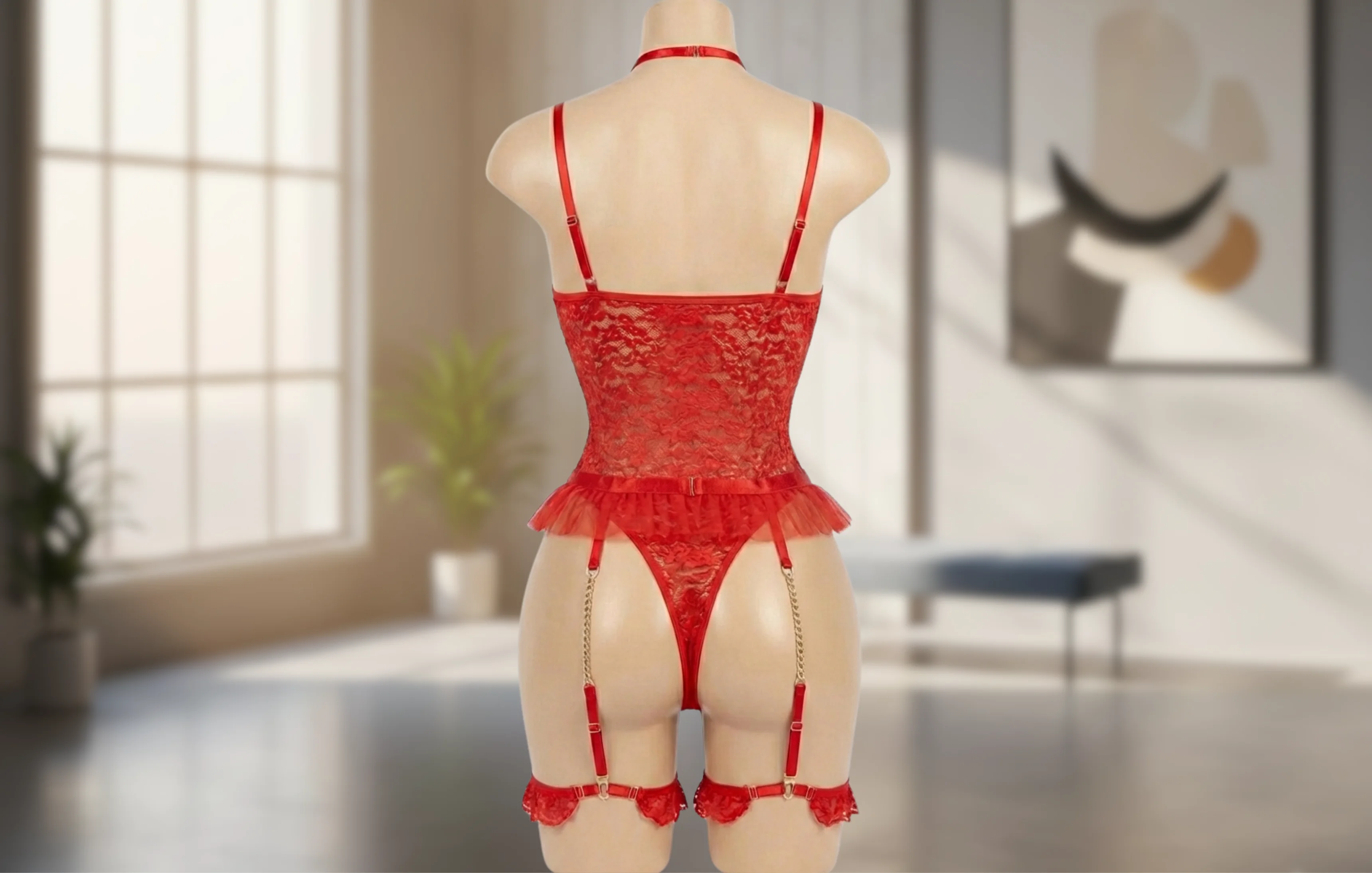 Ensemble lingerie rouge en dentelle avec jarretières et chaînes dorées