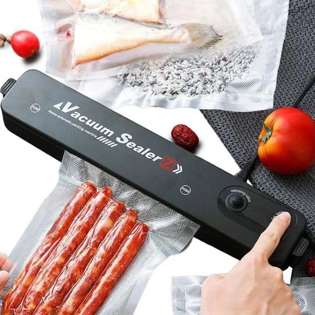Machine d'emballage alimentaire sous vide avec sacs en plastique