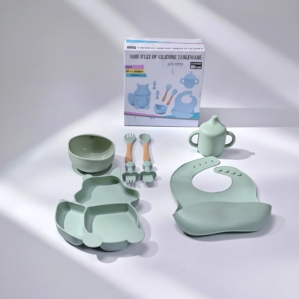 Kit Repas Bébé de 8 Pièces en Silicone avec Bavoir, Assiette Compartimentée, Bol à Ventouse, Tasse à Poignées, Cuillères et Fourchettes