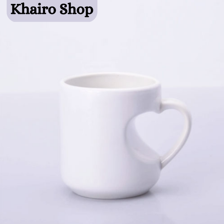 كوب  أبيض بمقبض على شكل قلب