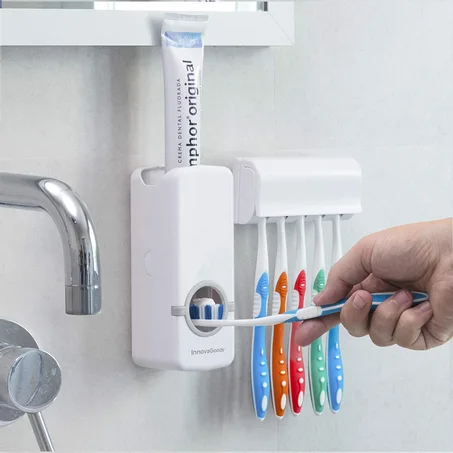 Distributeur de dentifrice avec support pour brosses à dents