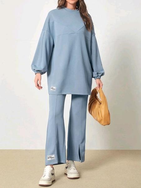 Felpe spalle cadenti manica a lanterna con dettaglio di patta