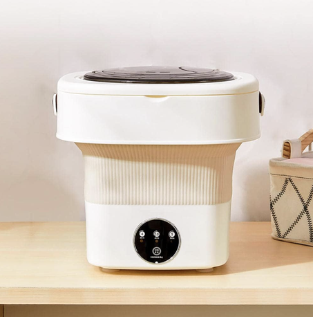 ماكينة صغيرة للملابس